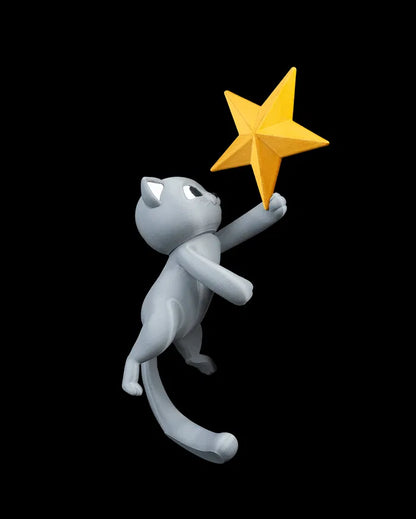 Décoration de cime de sapin - Chat jouant avec étoile